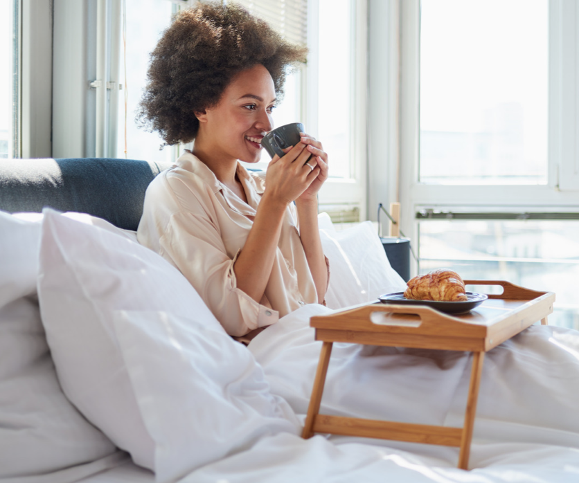 woman smiling on bed woman smiling on bed